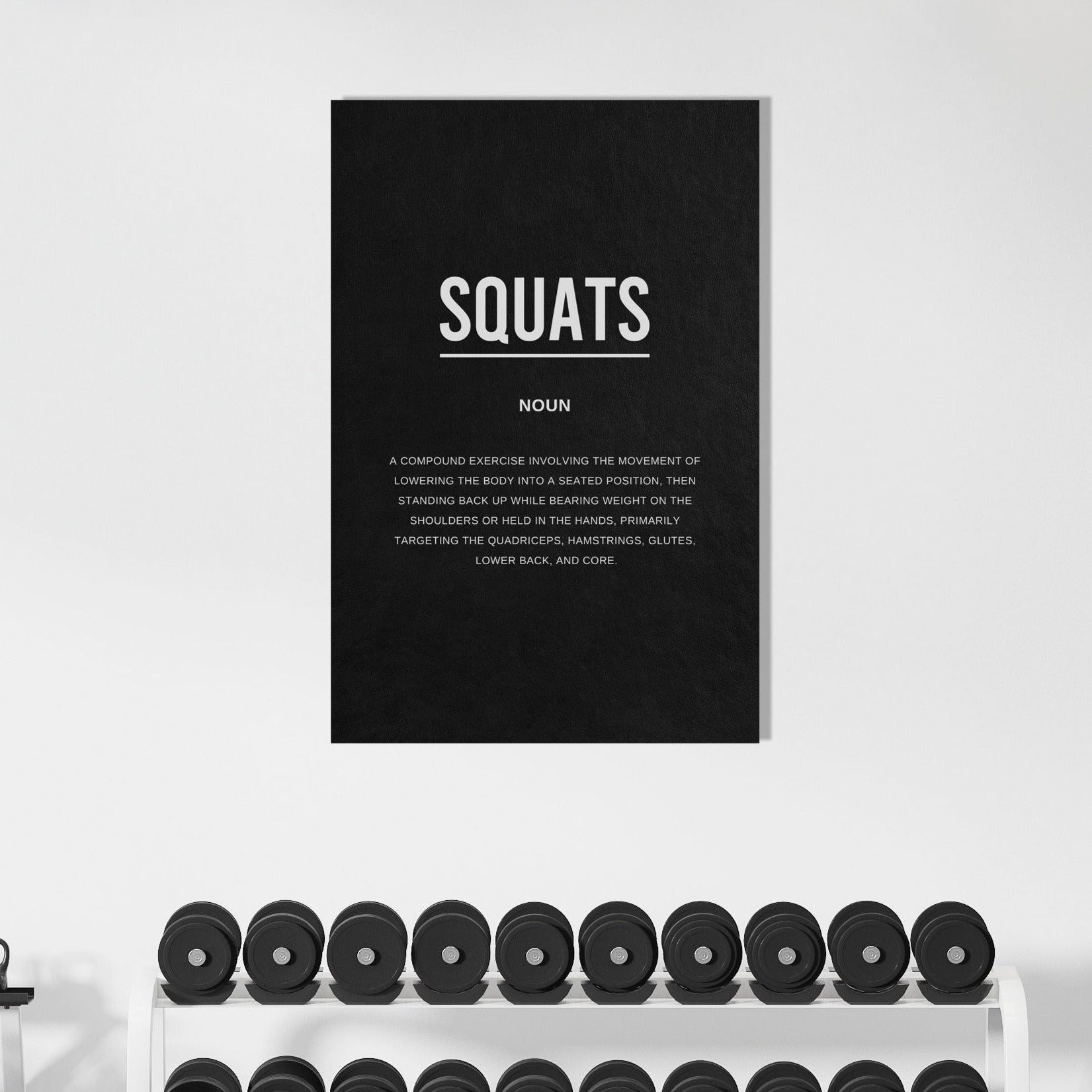 Gym interior with weightlifting equipment and a 'Squats' poster on the wall.